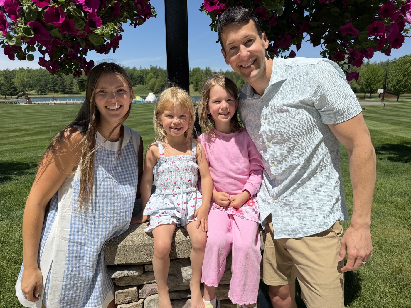 Sarah and Chase Beatty with their two daughters at a Vegan Wellness Retreats venue