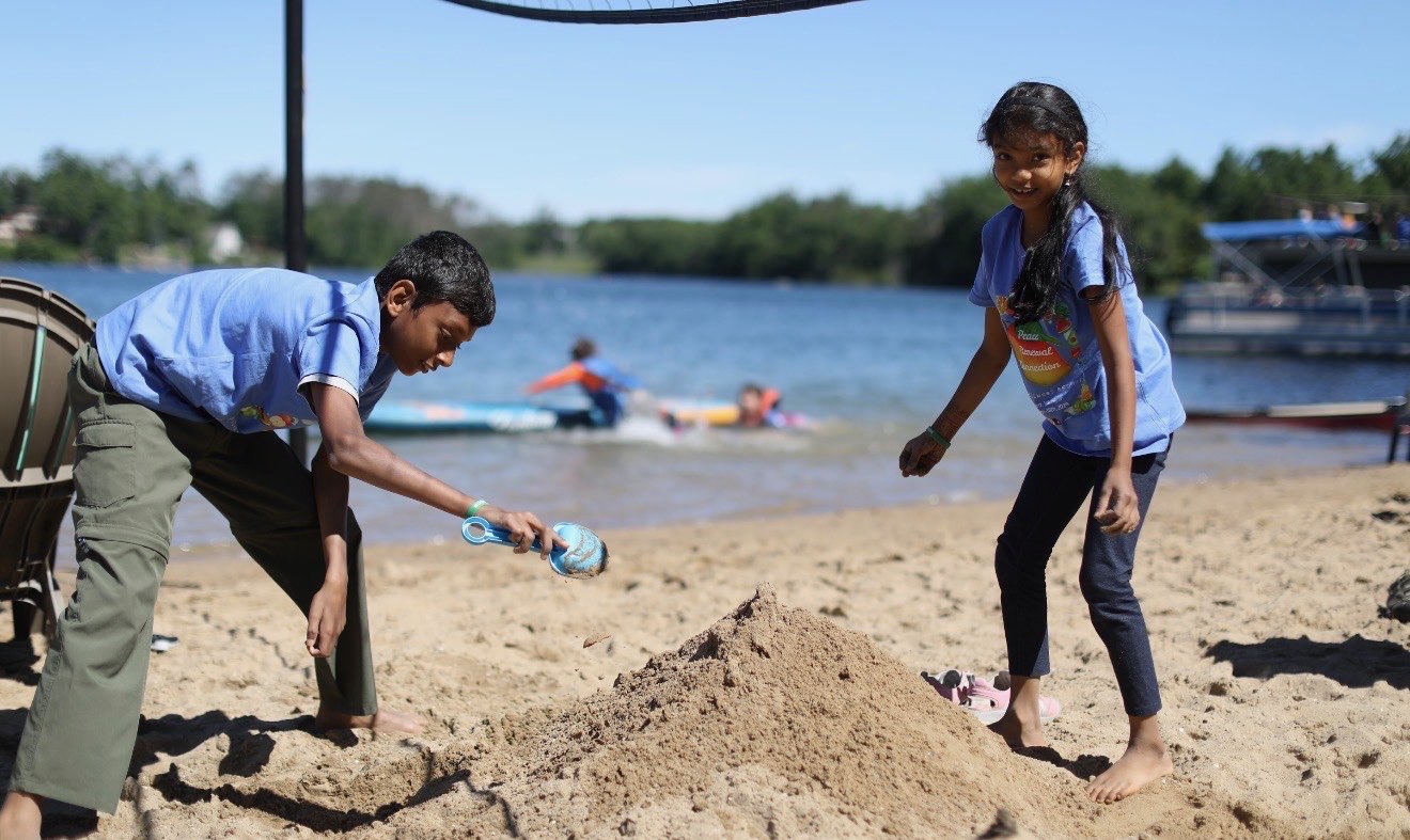 Kids playing at the lakefront