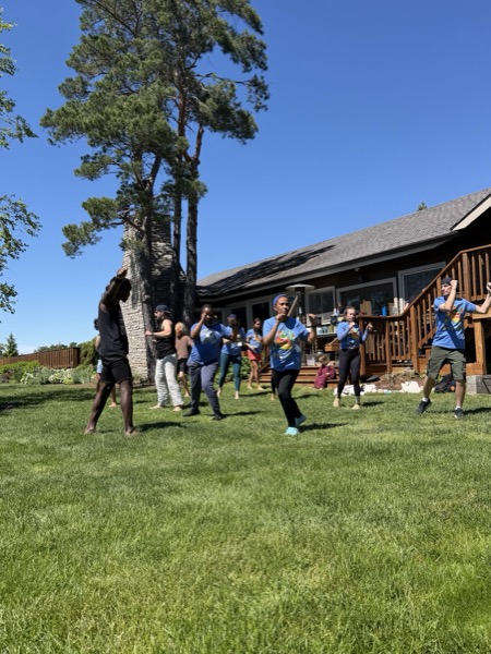 Vegan Wellness Retreats — guests dancing on the lawn
