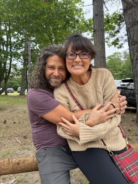 Vegan Wellness Retreats — two guests sharing a hug