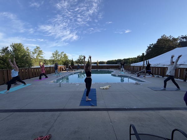 Vegan Wellness Retreats — morning yoga on the pool deck