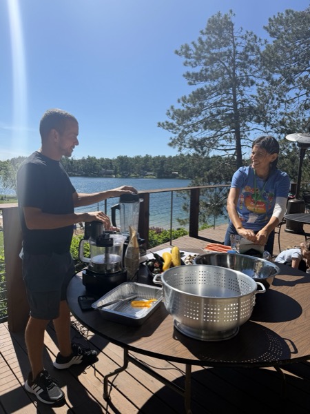 Vegan Wellness Retreats — an outdoor cooking demo by the lake