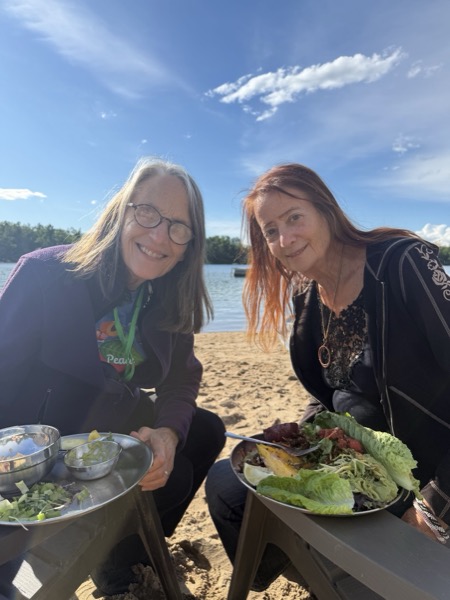Vegan Wellness Retreats — two guests taking a lakeside selfie