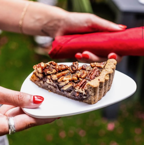 A slice of pecan tart served on a plate at a VWR retreat