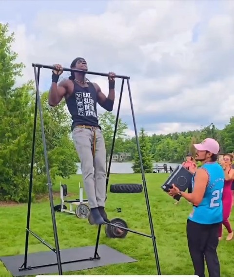 Athlete competing in the VWR Vegan Olympics pull-up competition