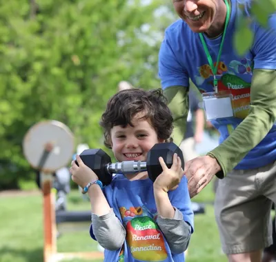 A dad and his young son together at a VWR retreat
